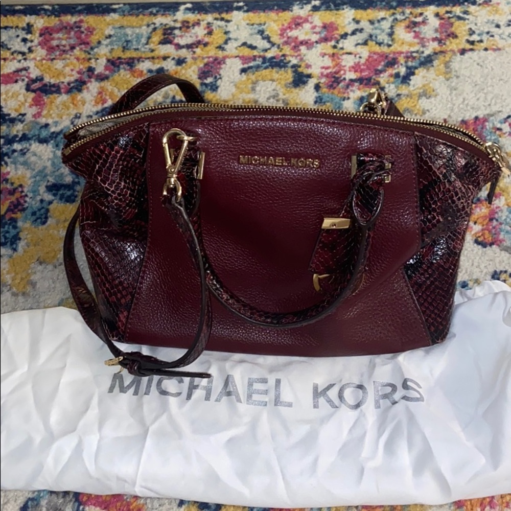 Wine colored Michael Kors bag.